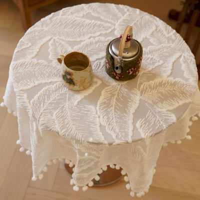 Embroidered voile tablecloth with a lace effect and openwork patterns, for round or square tables